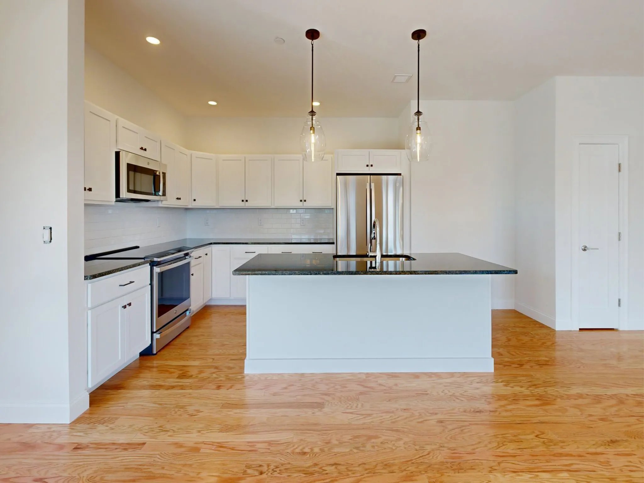 Kitchen with designer finishes in the Wind II at Featherwinds in Halifax MA