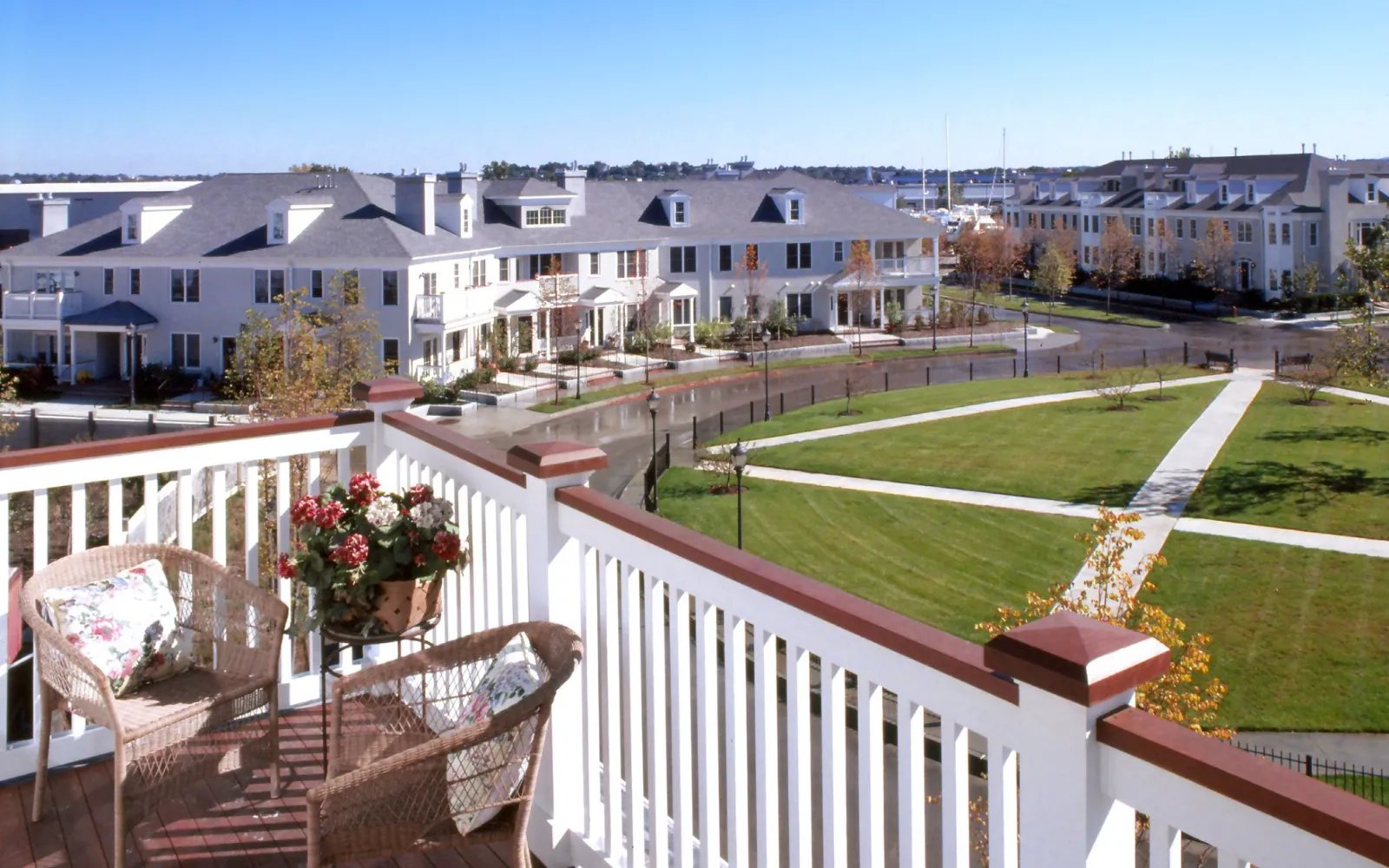 Balcony view of the village green and homes at Chapman's Reach, Thorndike Development in Quincy MA