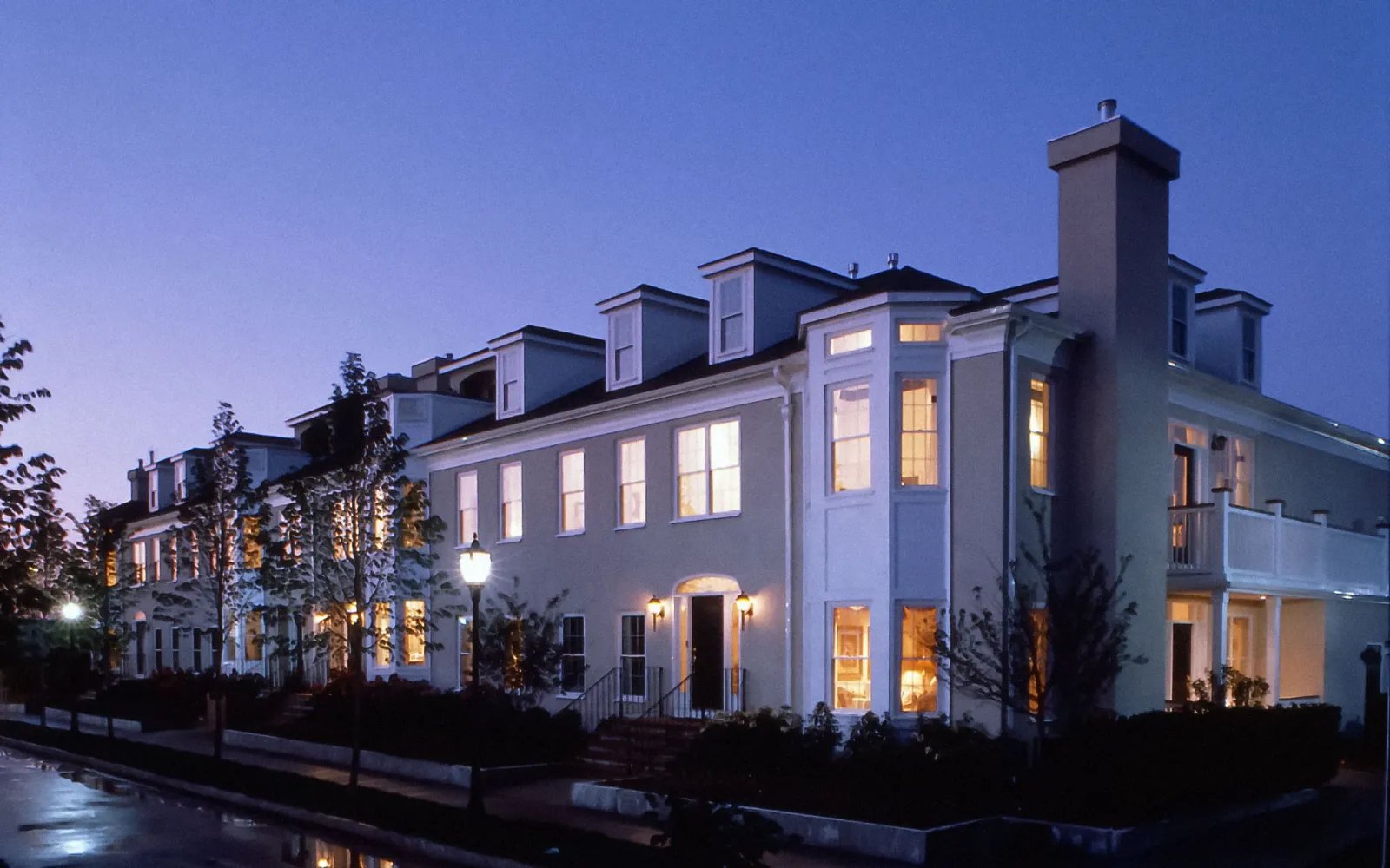 Twilight view of townhomes at Chapman's Reach, NAHB award-winning community at Marina Bay in Quincy MA