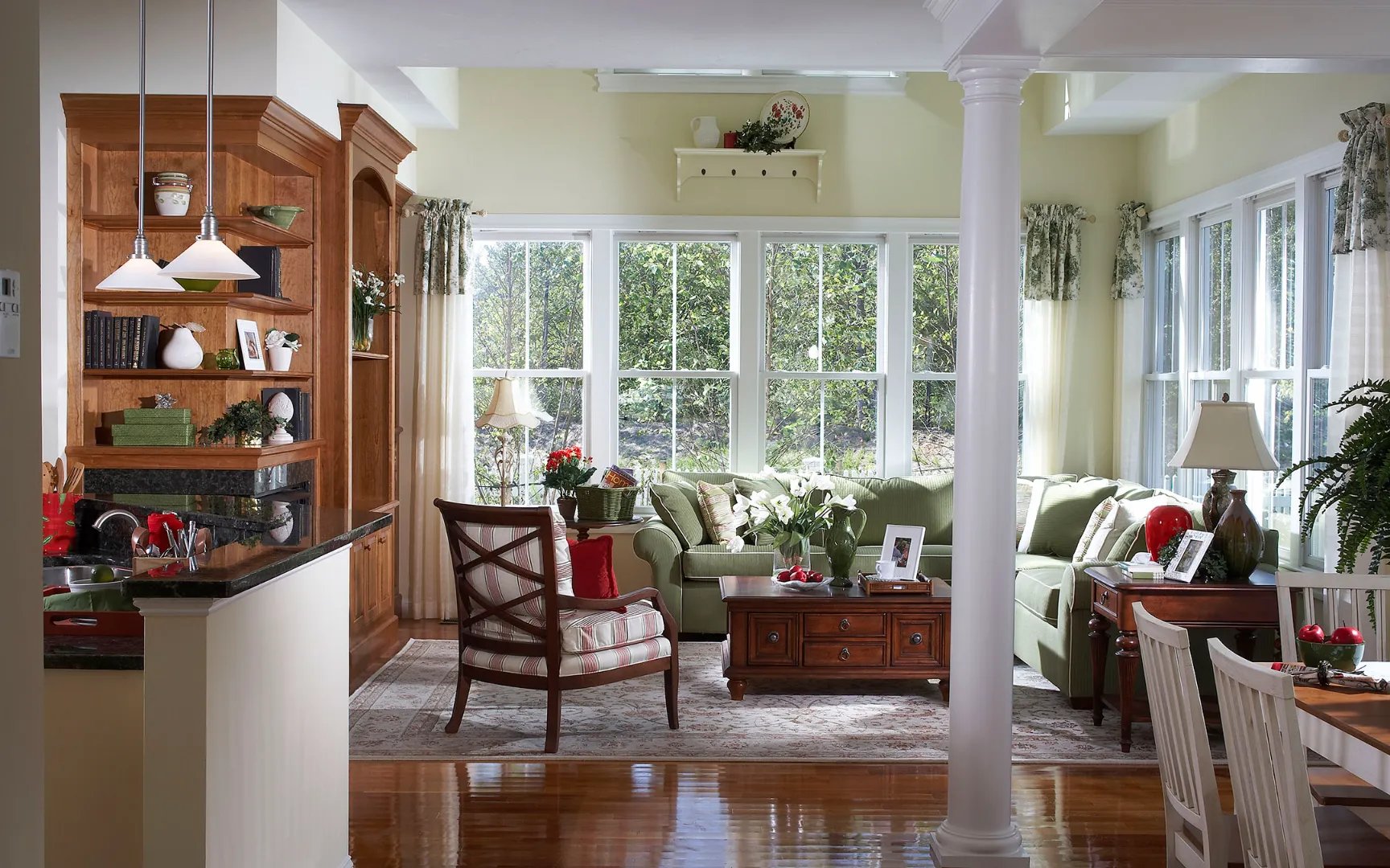 Bay window sitting room with natural light at Red Mill Village in Norton MA