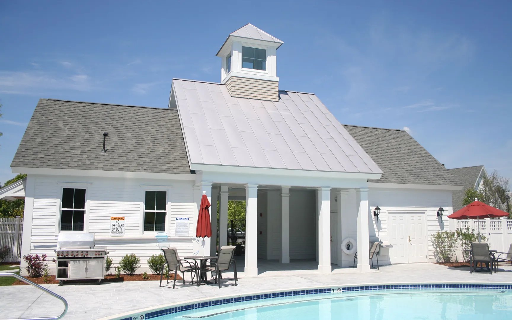 Pool house and swimming pool amenities at Red Mill Village, Smart Growth community in Norton MA