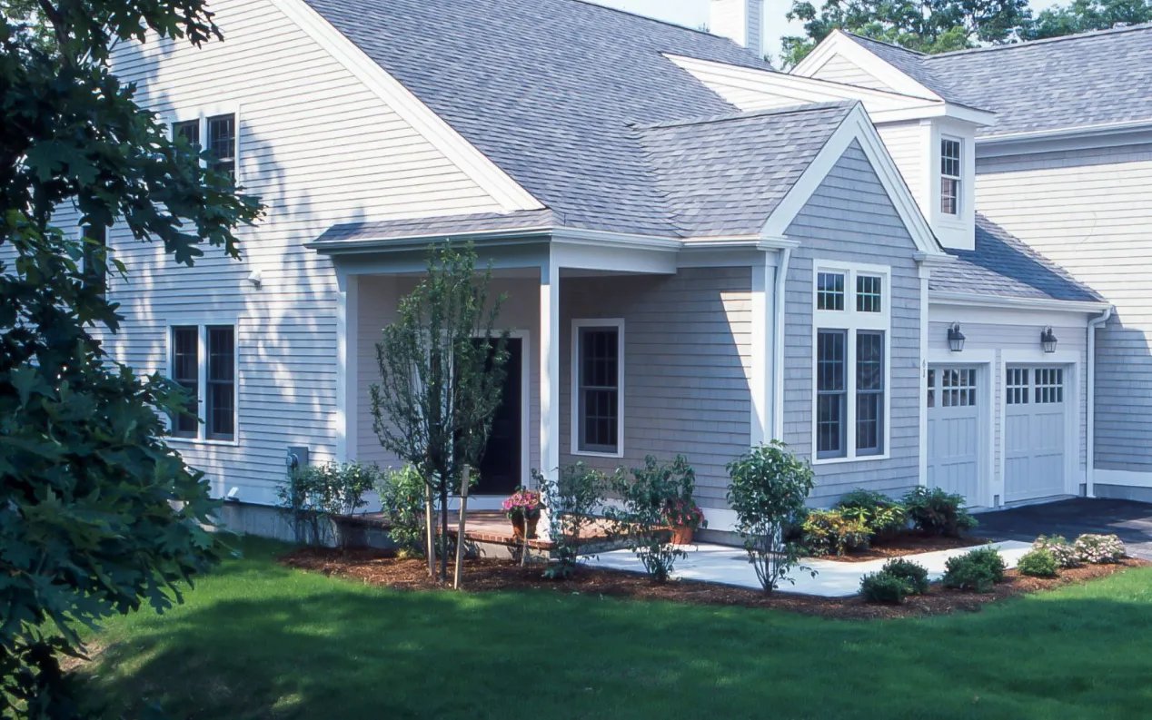Private rear yard with raised beds at a GreatBrook attached home in Norton Massachusetts