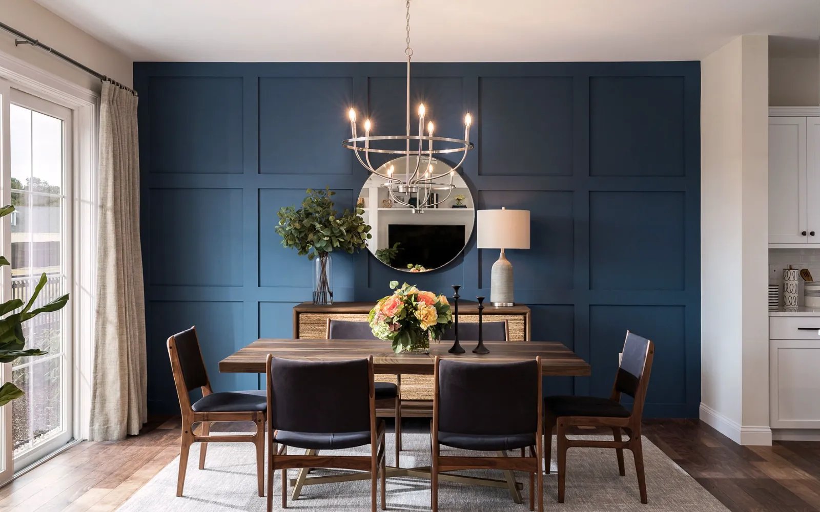 Formal dining space with navy accent wall in Sawyer's Reach Duxbury model Plymouth MA