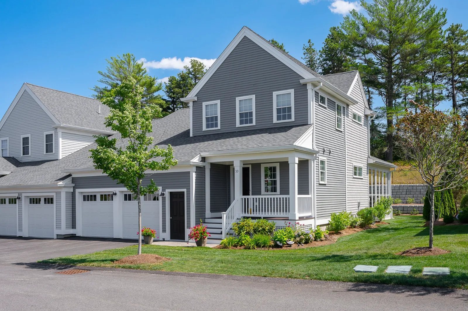 New construction townhome with front porch at Sawyer's Reach 55-plus community Plymouth MA