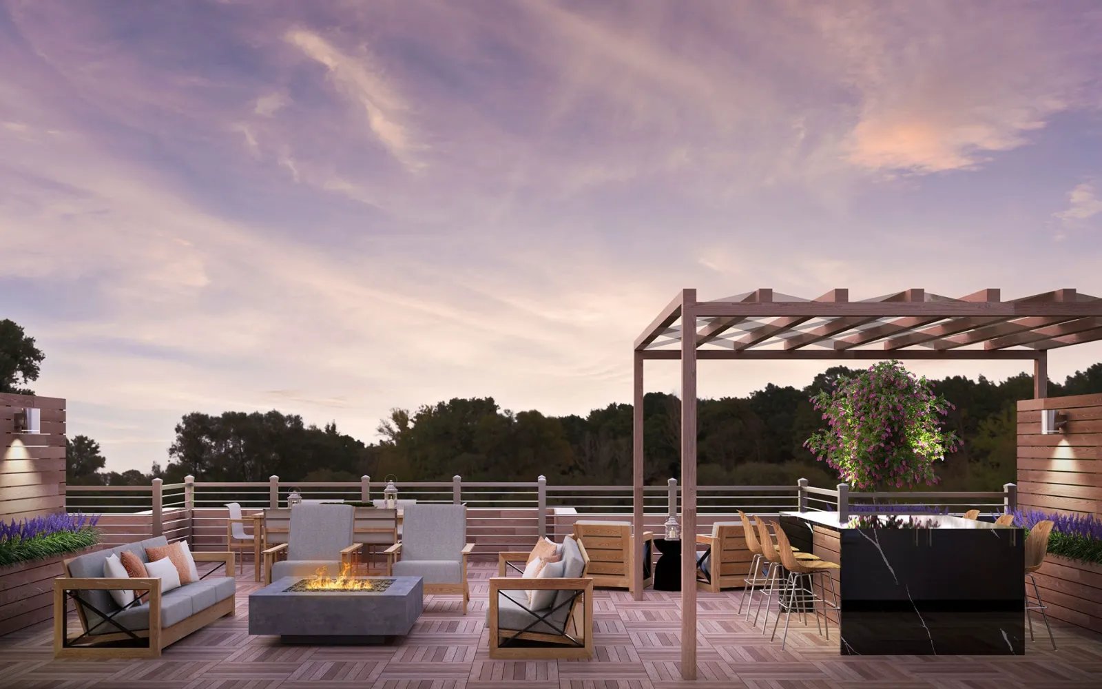 Sunset rooftop lounge with pergola and fire feature at Sawyer's Reach Plymouth MA