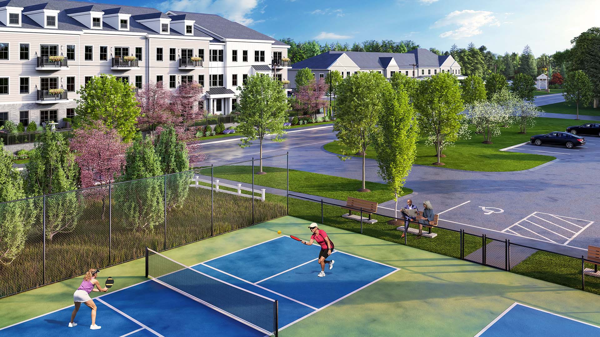 Pickleball courts and condo building at Featherwinds 55+ community in Halifax MA