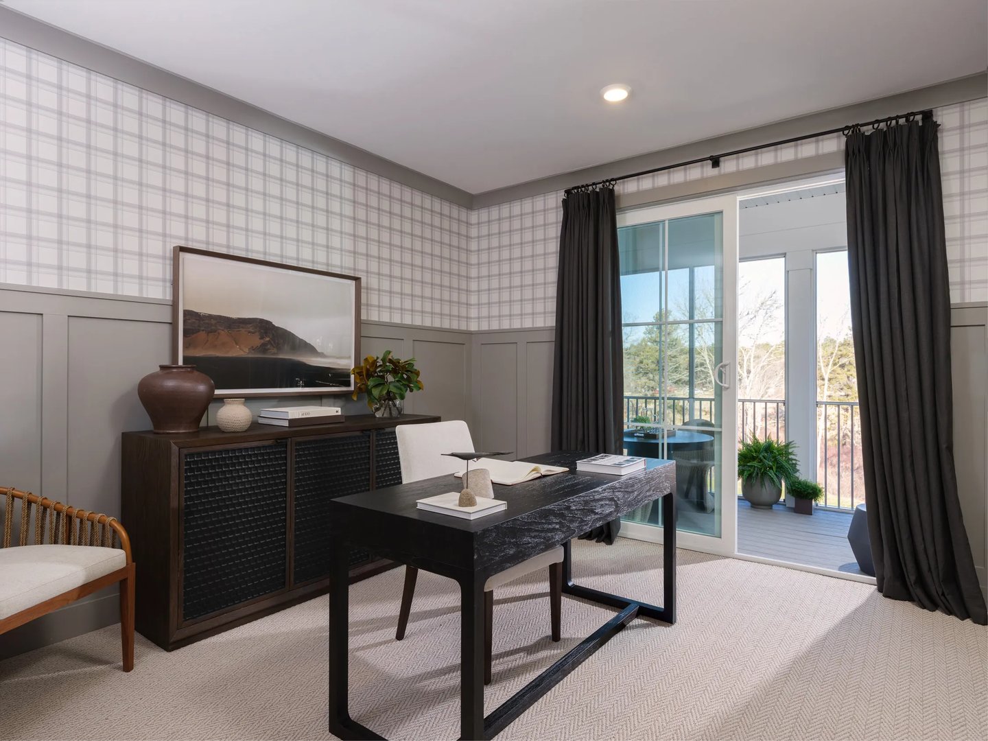 Home office with designer wallpaper and balcony access at Alden's Reach condos in Plymouth MA