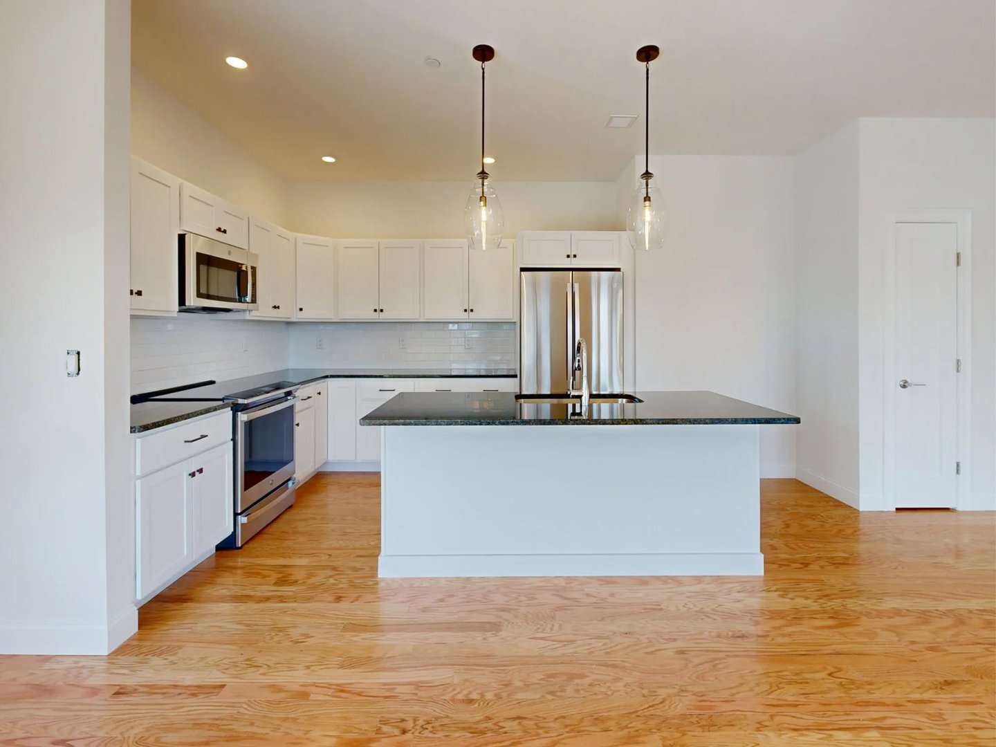 Kitchen with designer finishes in the Wind II at Featherwinds in Halifax MA