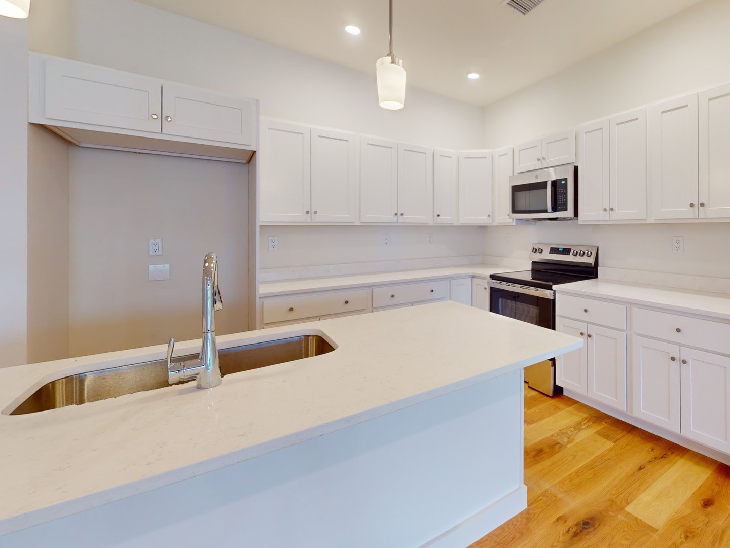 Kitchen with designer finishes in the Breeze IV at Featherwinds in Halifax MA