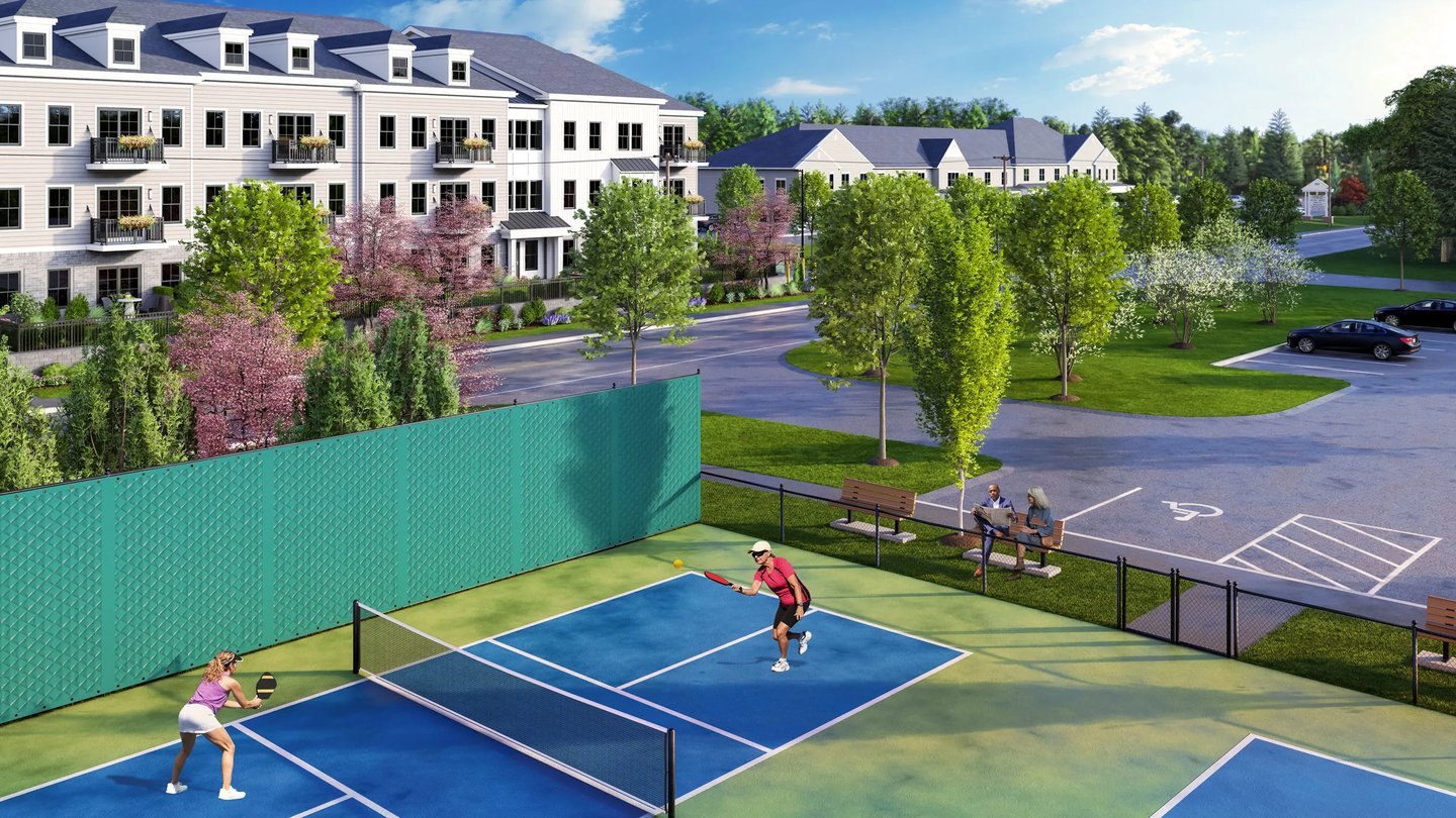 Pickleball courts looking toward Building 1 at Featherwinds in Halifax MA